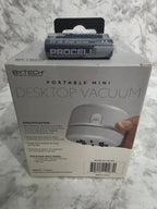 Bytech portable mini desktop vacuum packaging on a marble surface