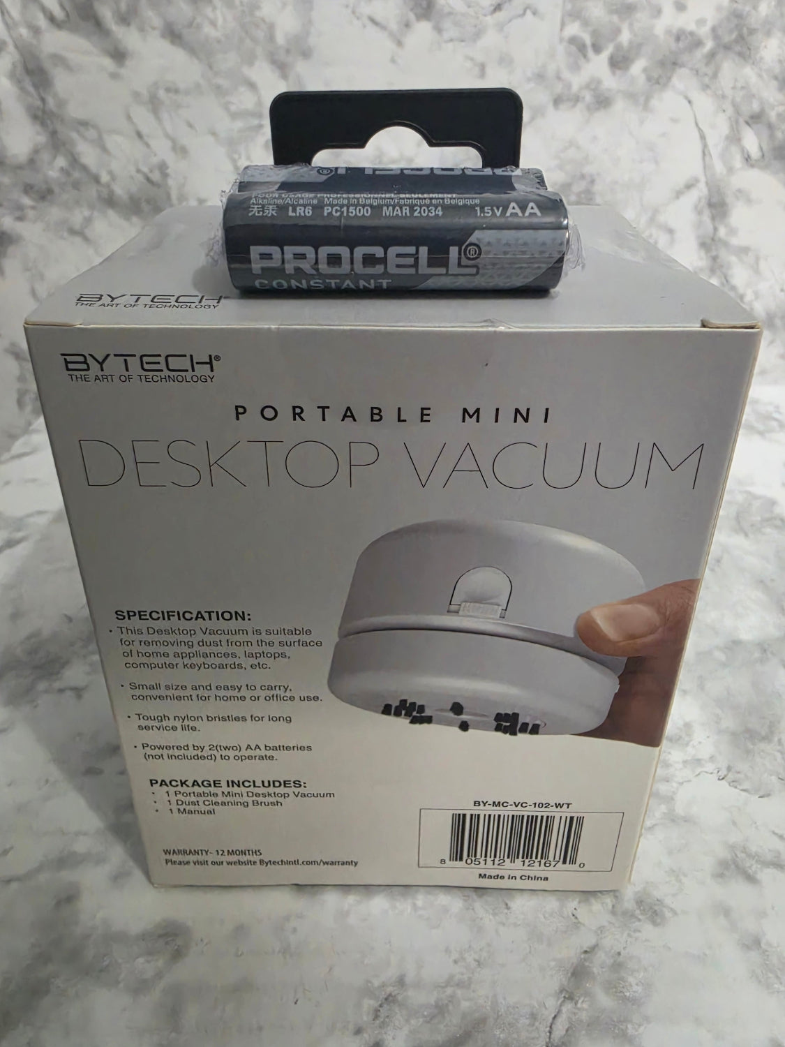 Bytech portable mini desktop vacuum packaging on a marble surface