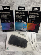 Skullcandy earbud packaging and earbud cleaning kit on a marble surface