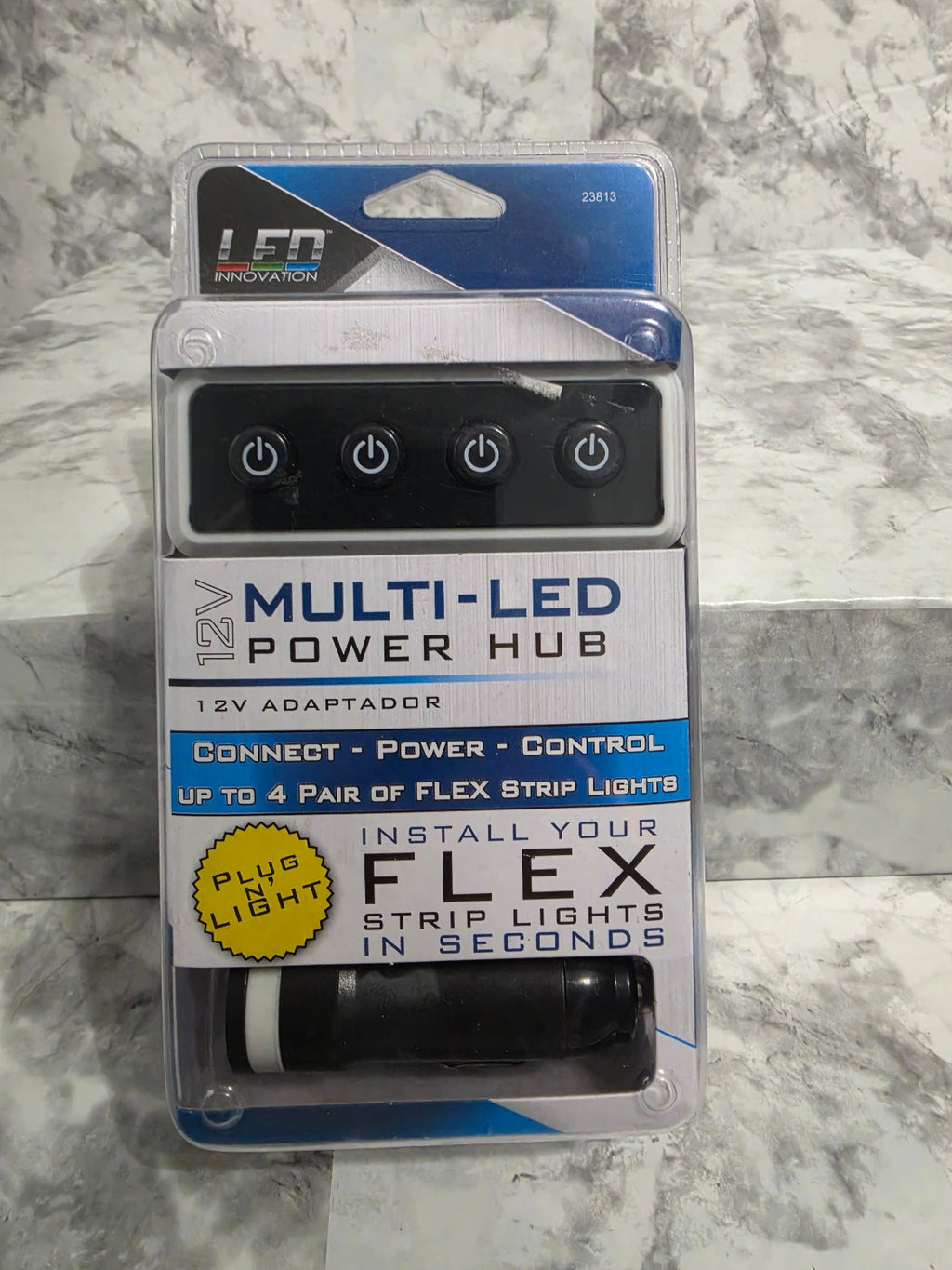Multi-LED Power Hub packaging on a gray marble background