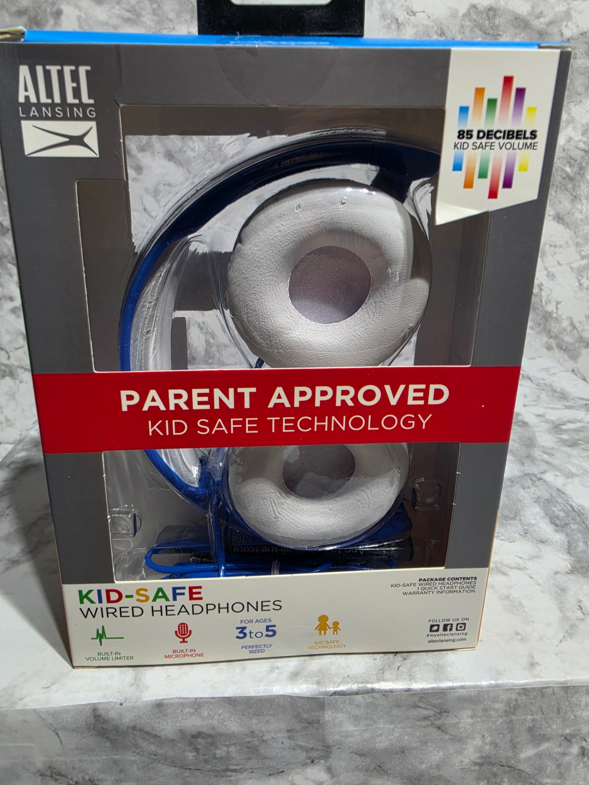 Altec Lansing Kid Safe Wired Over-Ear Headphones Blueberry Blue — 85dB volume limiter, ages 3-5, new in retail box, photographed on marble workspace at More4less Outlet Burlington KY