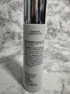 Cosmetic tube with label on a marble surface