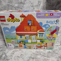 Actual stocked product photo of LEGO DUPLO Bluey's Family House with Memory Game 10459 retail box.