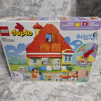Actual stocked product photo of LEGO DUPLO Bluey's Family House with Memory Game 10459 retail box.