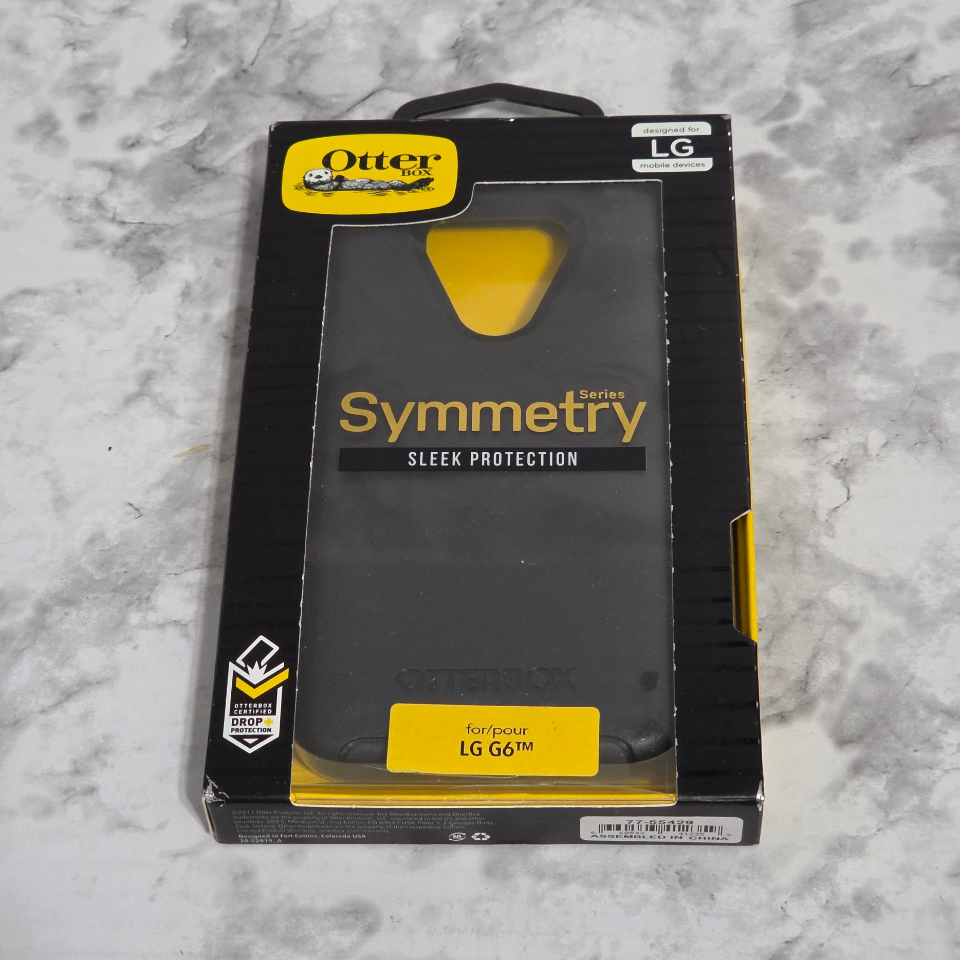 OtterBox Symmetry Series Case for LG G6 – real product retail packaging showing black case and drop protection badge