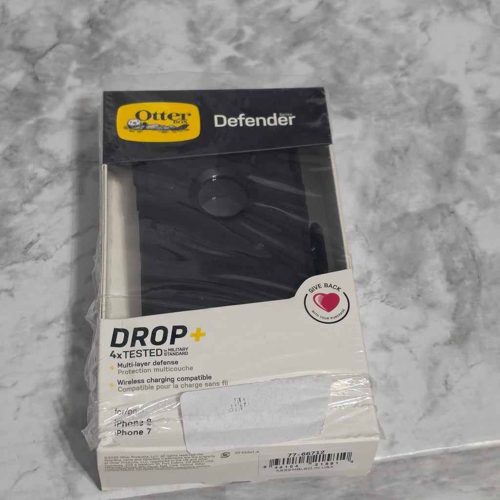OtterBox Defender Series case for iPhone 8 and iPhone 7 – black – new in original retail box showing DROP+ 4X tested military standard, multi-layer defense, wireless charging compatible, and Assembled in USA