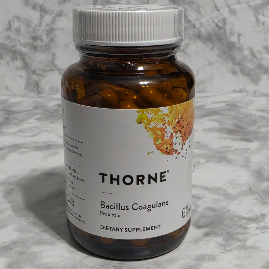 Thorne Bacillus Coagulans Probiotic 60 Capsules - amber glass bottle on marble