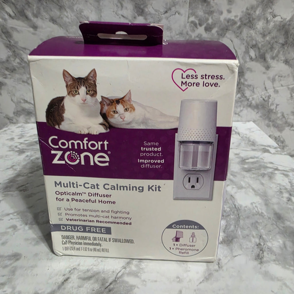 Comfort Zone Multi-Cat Calming Kit Opticalm Diffuser box showing two cats, drug free label, and contents including 1 diffuser and 1 pheromone refill