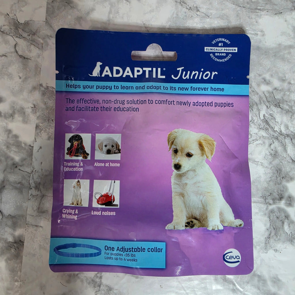 ADAPTIL Junior puppy calming collar in original blue and purple retail packaging by Ceva