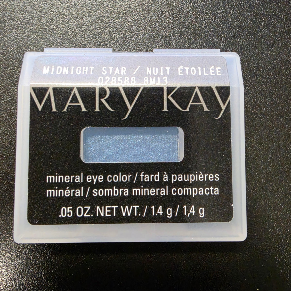 Mary Kay Mineral Eye Color Midnight Star refill case, with the shade label facing forward