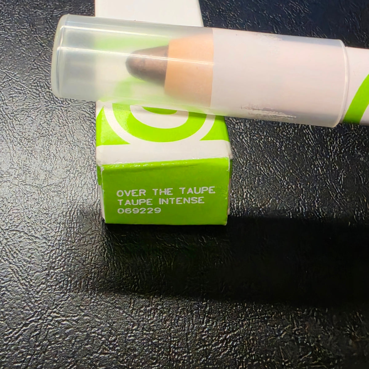 Mary Kay At Play Over the Taupe 069229 capped tip and matching carton.