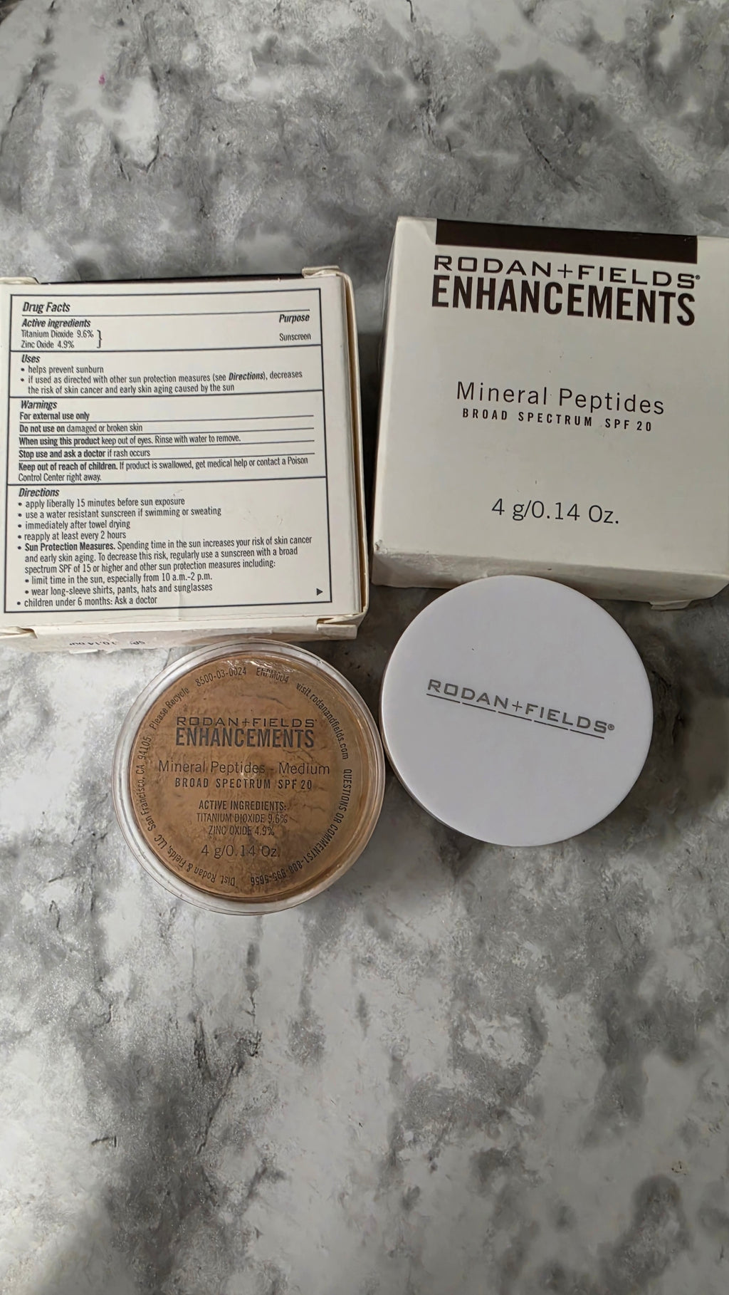 Actual stocked Rodan + Fields Enhancements Mineral Peptides Medium SPF 20 jars and box