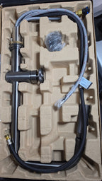 Actual stocked Kraus Urbix Industrial Pull-Down Kitchen Faucet in Black Stainless Steel in packaging