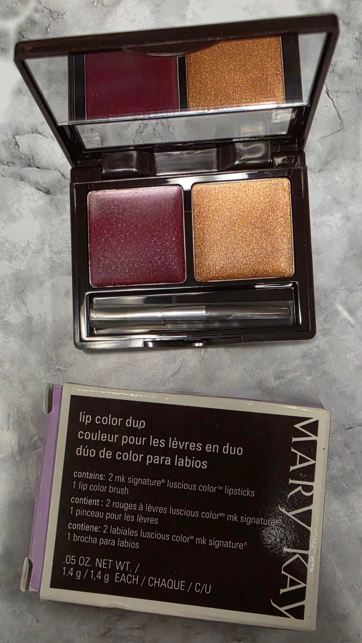 Actual stocked Mary Kay Lip Color Duo Garnet and Gold compact opened with brush and retail box