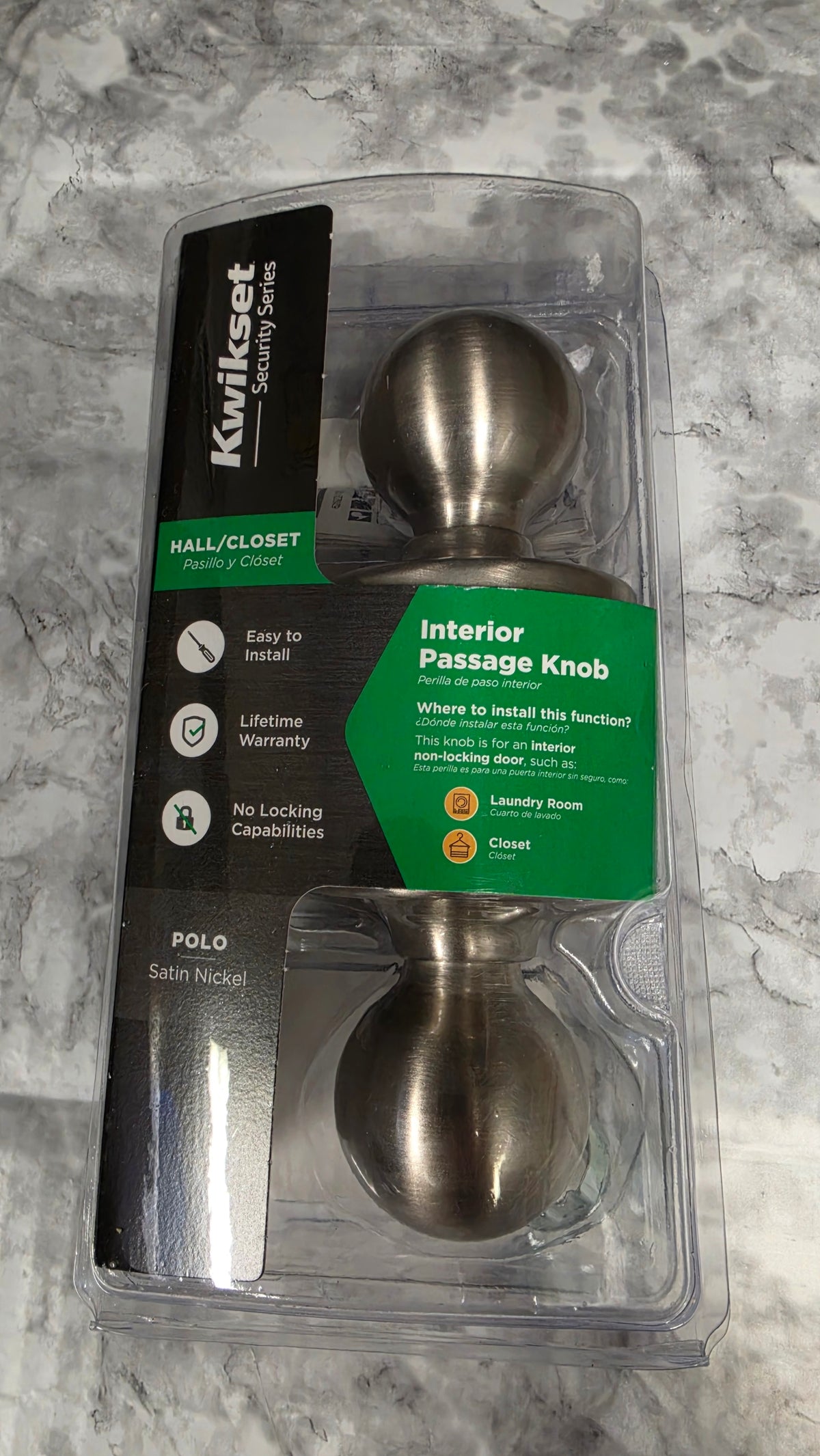 Actual stocked Kwikset Polo interior passage door knob in satin nickel sealed package