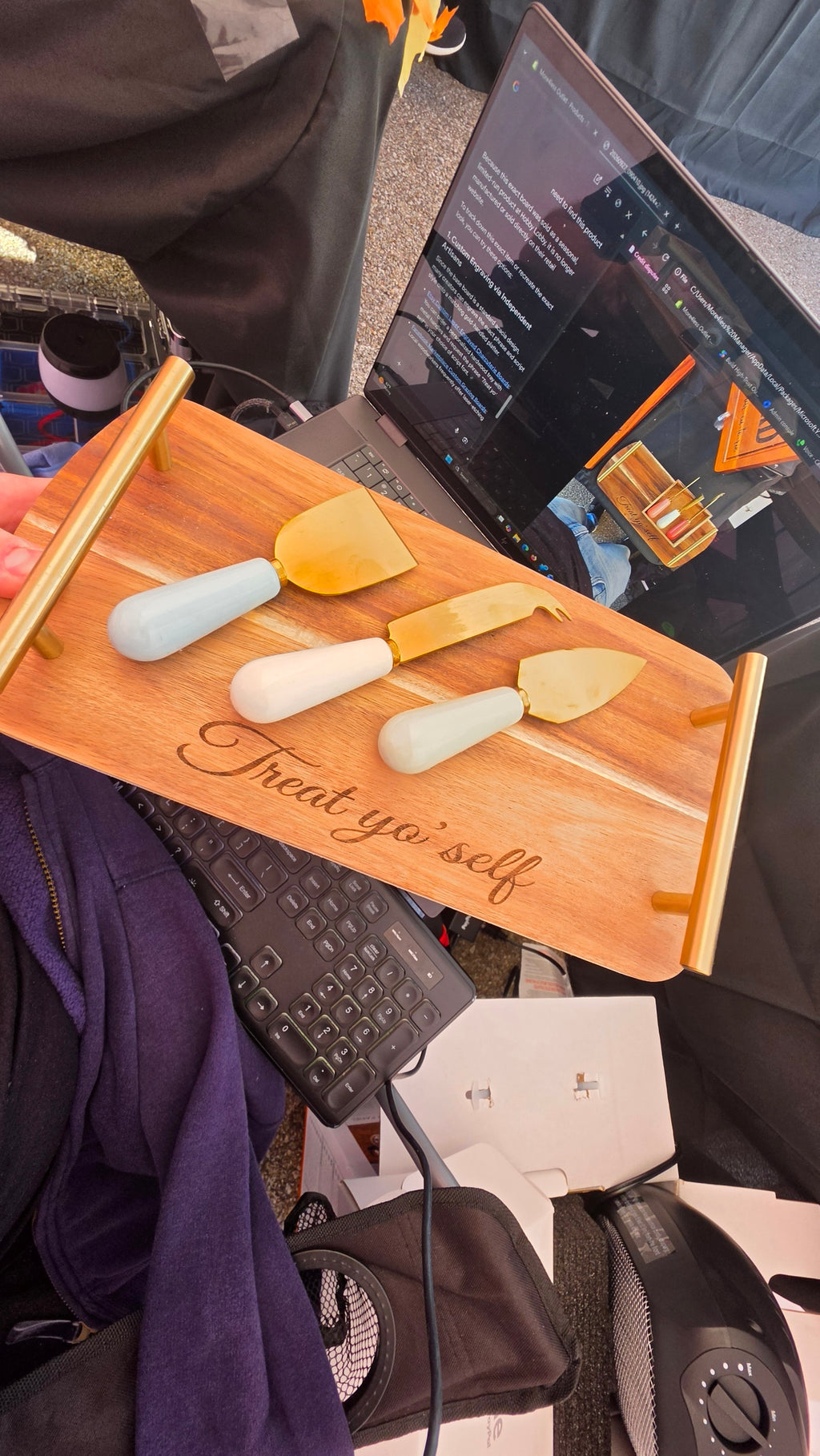 Actual stocked Treat yo' self engraved acacia cheese tray showing gold-tone tools and handles