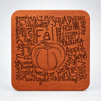 Square wood coaster with an autumn word collage and pumpkin