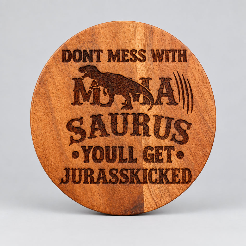 Round wood coaster with a dinosaur silhouette and humorous lettering