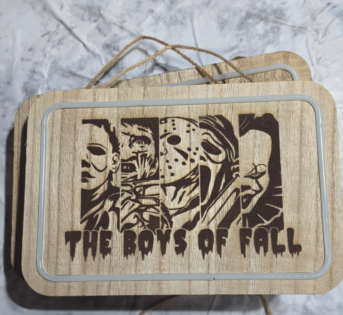 Actual The Boys of Fall horror-themed laser-engraved LED hanging plaque.