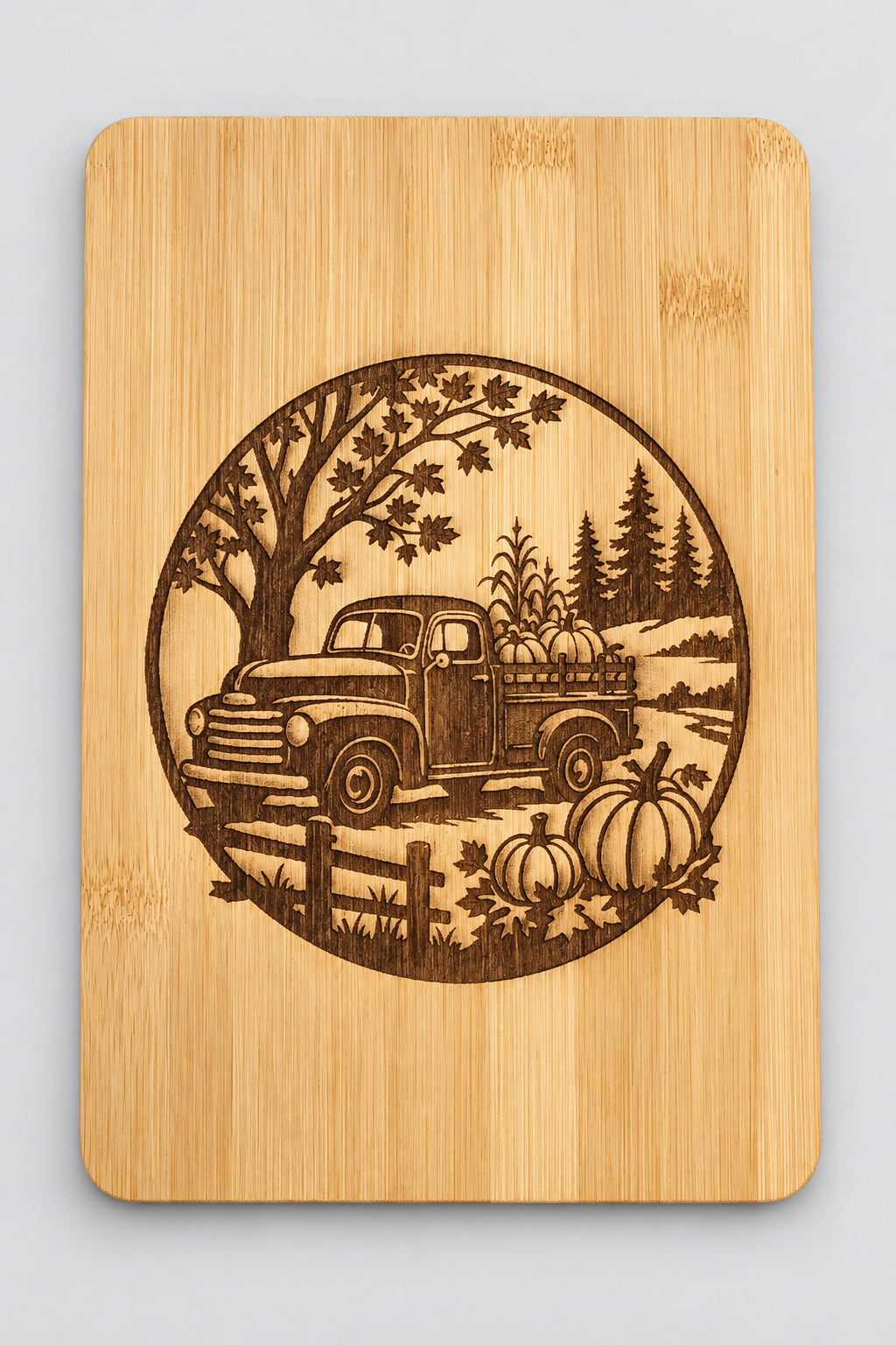 Engraved bamboo cutting board with Fall Pumpkin Truck design