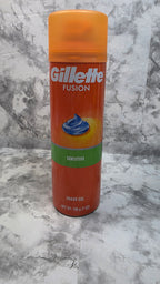 Front of an orange Gillette Fusion Sensitive shave gel can, 7 oz