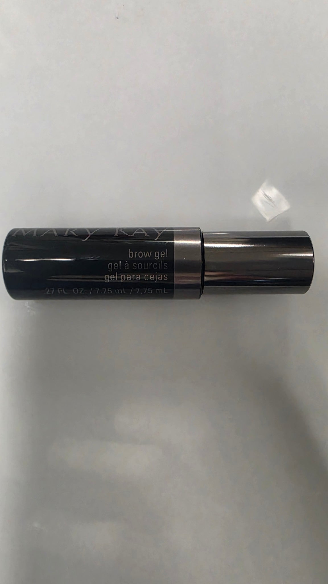 Mary Kay Clear Brow Gel in its original black tube