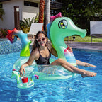 Adult using the PoolCandy Glitter Seahorse pool tube with the matching drink float beside it