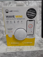Airthings Wave Mini air quality monitor packaging on a marble surface