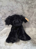 Actual Animal Adventure charcoal-black puppy plush with floppy ears, a dark stitched nose, gray paw tips and attached hangtag