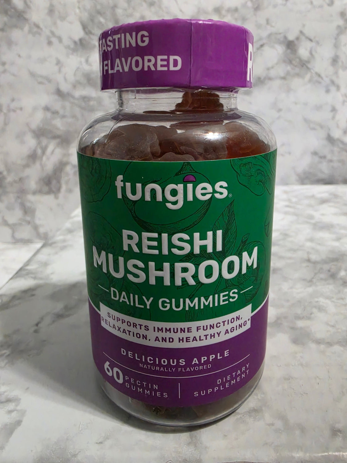Bottle of Fungies Reishi Mushroom gummies on a marble surface
