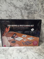 Boxed drawing and sketching set on a marble surface