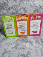 Collagen eye pad packaging on a marble surface