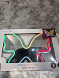 Color-changing LED mirror packaging on a marble surface