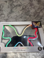 Color-changing LED mirror packaging on a marble surface