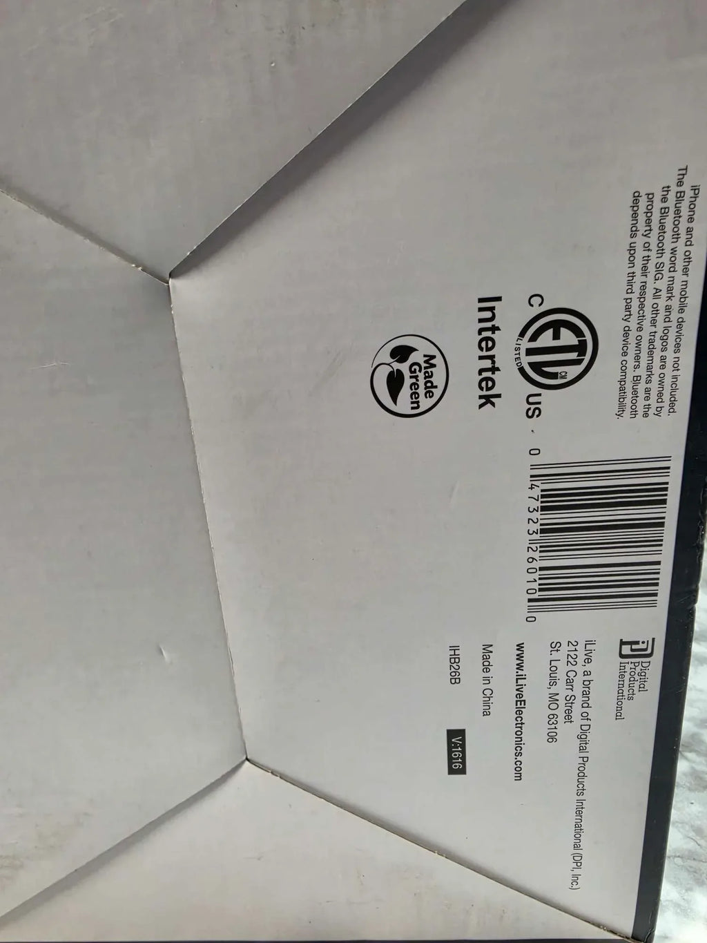 Close-up of a product packaging corner with Intertek and CE certification logos.