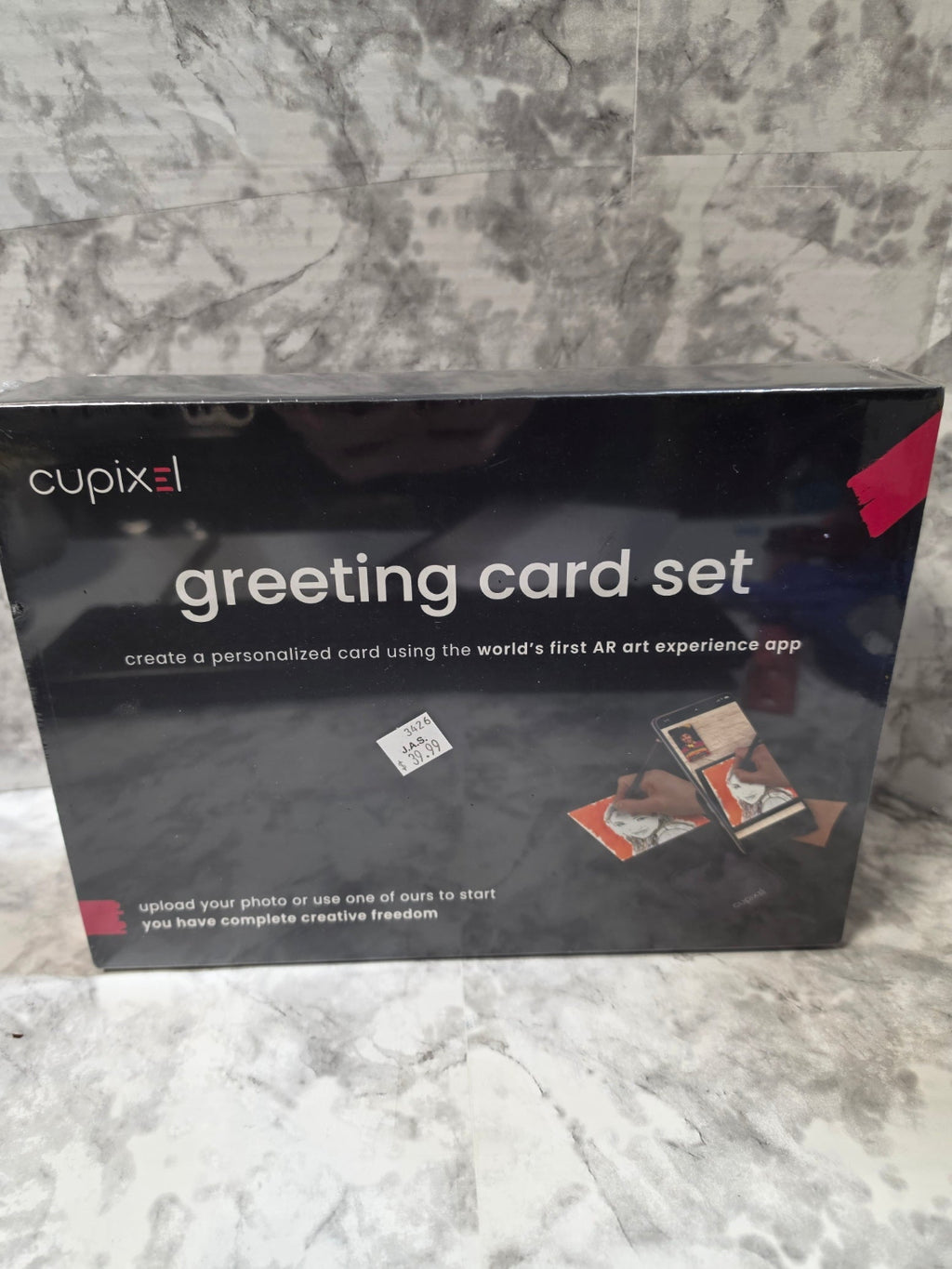 Cupixi greeting card set packaging on a marble surface