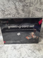 Cupixi greeting card set packaging on a marble surface