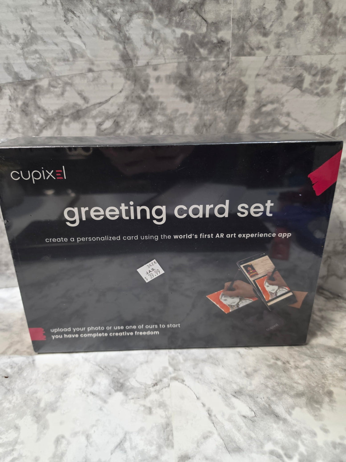 Cupixi greeting card set packaging on a marble surface