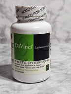 DaVinci Laboratories supplement bottle on a marble surface