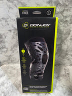 Donjoy knee support packaging on a marble surface