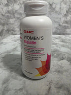 GNC Women's Gelatin bottle on a marble surface