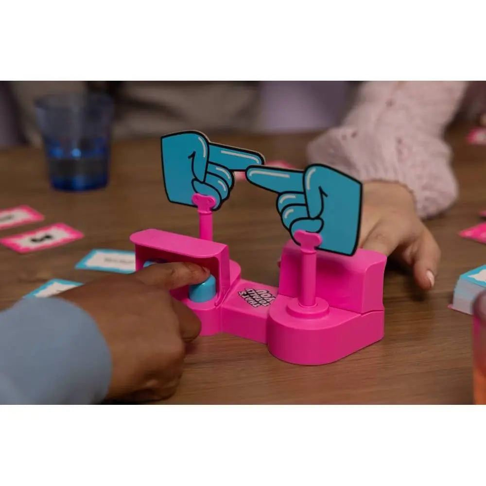 That's Totally You! board game by Big Potato, featuring colorful game pieces and lively action-packed gameplay scene.