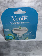 Gillette Venus Smooth Sensitive razor packaging on a marble surface