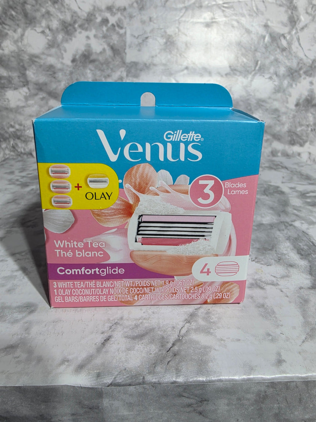 Gillette Venus razor packaging on a marble surface