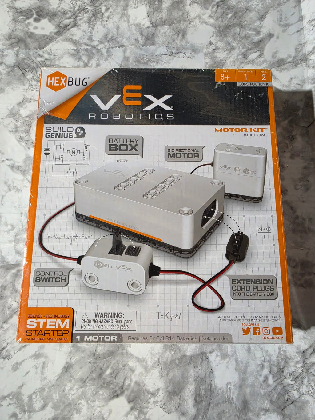 Hexbug robotics product packaging on a marble surface