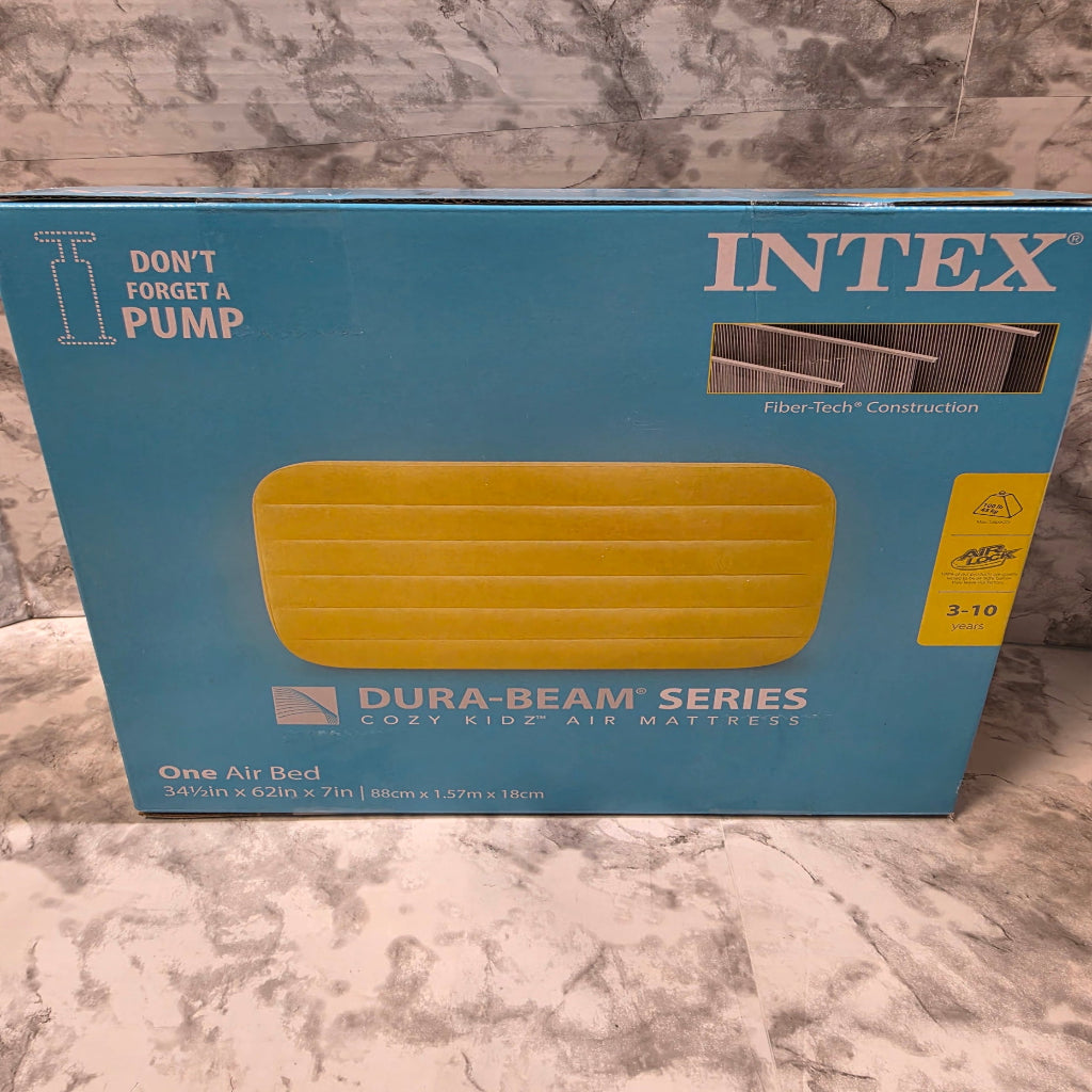 Intex Dura Beam Series air bed packaging on a marble surface