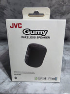JVC GUMY wireless speaker packaging on a gray marble surface