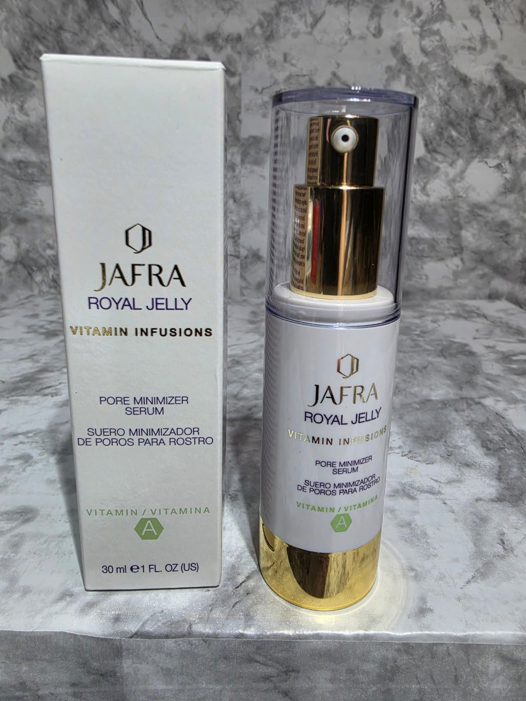 Jafra Royal Jelly Vitamin Infusions skincare product on a marble surface