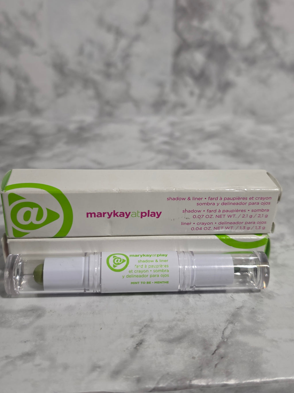 Mary Kay product with packaging on a marble surface