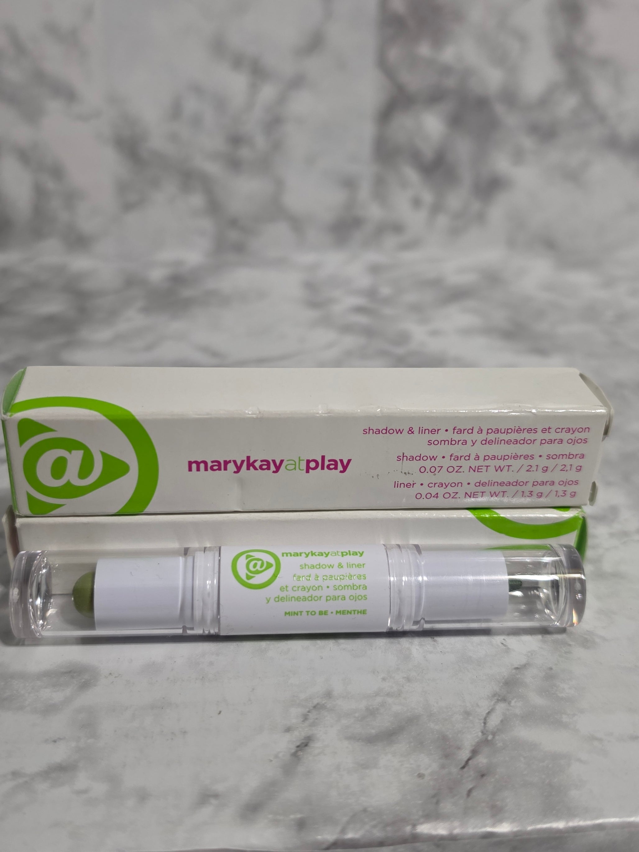 Mary Kay product with packaging on a marble surface